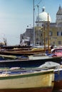 PROCIDA, ITALY, 1970 -The dome of the Church of S. Maria della PietÃÂ  and St. Giovanni Battista dominates the dry boats